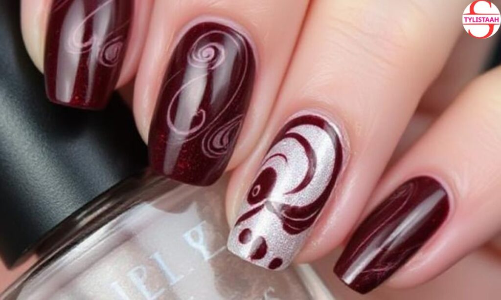 garnet-swirl-nail-design
