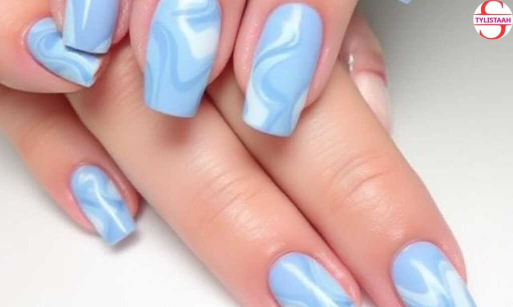 pastel-blue-swirl-nail-design